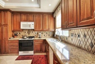 Spacious kitchen provides ample cabinet and counte