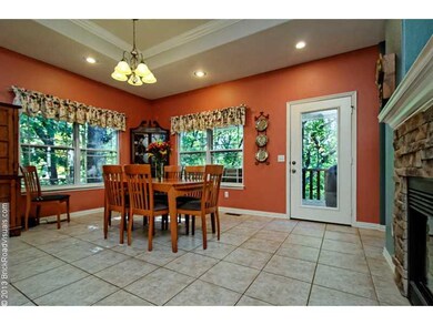 Dining Room. Panoramic views of the wooded yard!
