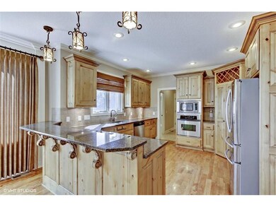Custom Knotty Alder Cabinets with Huge Walk-In Pan