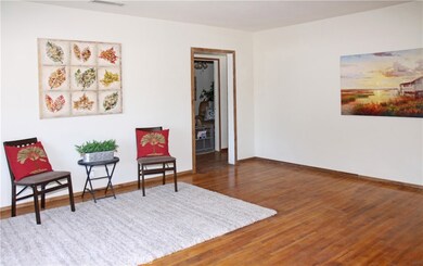 Family room w/ hallway to the bedrooms