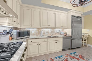 Kitchen with premium appliances, decorative backsp