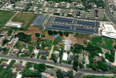 View of property location with nearby suburban area and property parcel outlined