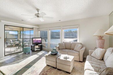 Window wall and large slider give way to lake view