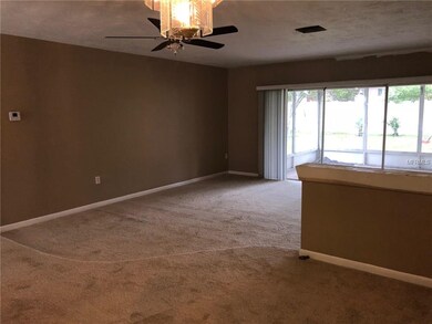 DINING-LIVING.VIEW OF SCREEN PORCH & YARD
