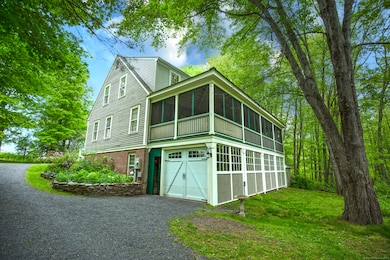 tandem garage bay under screened porch