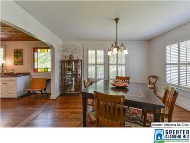 Spacious living room with stone fireplace.  Smooth