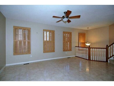 Family Room. The custom shutter blinds are include