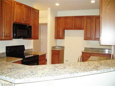 Kitchen - Kitchen also adjoins utility hall with a