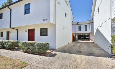 Two reserved parking spots in the back carport
