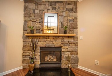 Your custom stacked-stone gas fireplace will keep 