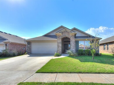 View of front of property with a front yard and a 