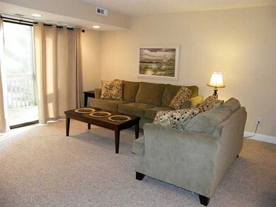 Living Room. Sliders to Private Deck