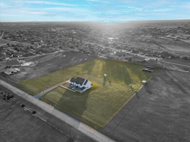 5 acres to make your own.  Pipe fence with two cross fenced pasture areas.