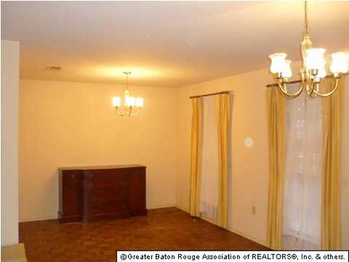 Formal Dining with vintage parquet wood tile floor