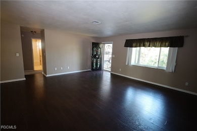 Spacious Living Room with laminate flooring