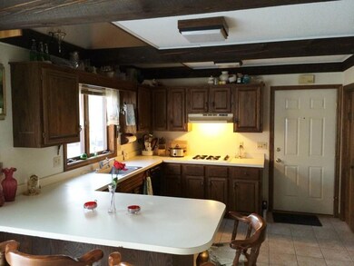 Fully applianced kitchen offers tile...