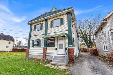 View of front of home featuring a front lawn