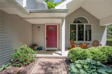 Beautiful landscaping and an inviting front porch 