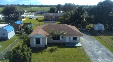 832 SW Avenue I, Belle Glade, FL 33430 - photo 2