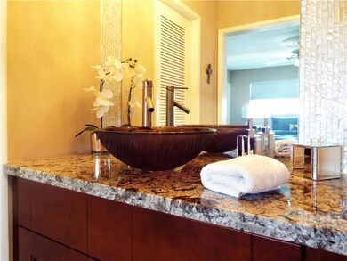 GRANITE COUNTER, GLASS VESSEL SINK, CUSTOM MIRRORS