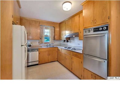 Kitchen with plenty of cabinets and double oven.