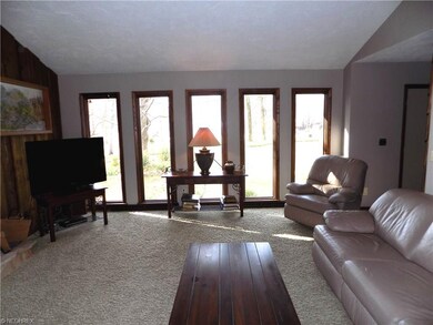 Looking out front in wooded lot, floor to ceiling 
