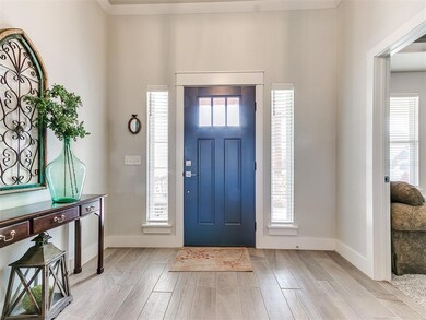 Foyer entrance with a healthy amount of sunlight a