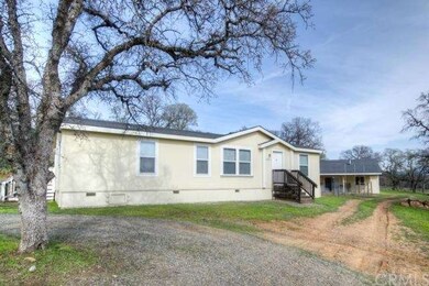 2004 manufactured home with detached studio and 2-