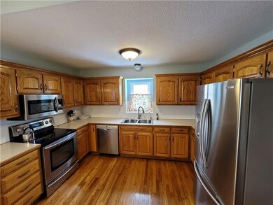 702 Garnes St, Raymore, MO 64083 - photo 7