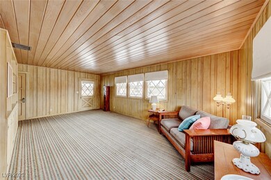 wood paneled ceiling and walls