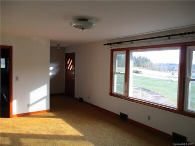 Living Room looking to front hall and beautiful vi