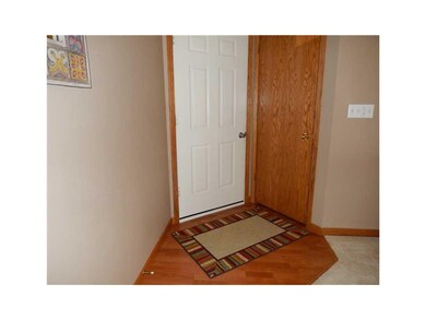 Entryway. Interior entry door, Pergo flooring and 