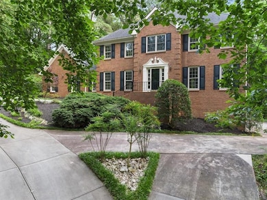 View of front facade featuring brick siding