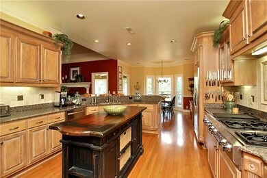 Eat-in kitchen is perfect place to grab a quick breakfast or snack on the go.  Home also includes a formal dining room for important dinners & family gatherings!