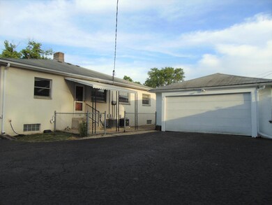 Garage with Patio Convenience