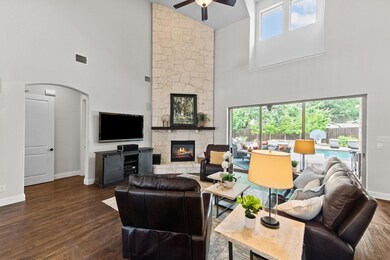 Beautiful floor to ceiling stone fireplace brings warmth and coziness to this space. The panoramic patio doors might become your favorite feature...lets take a sneak peek.
