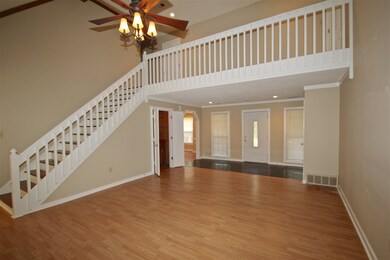 Spacious, warm and inviting great room with a loft
