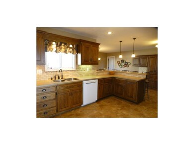 Spacious kitchen with space for eat in table and f