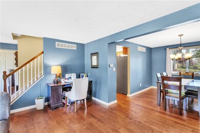 The Living Room is Open to the Dining Room.  Stair