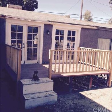 Porch/deck through the French doors from the livin