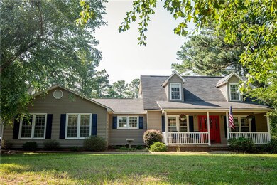 Beautiful Country home on wooded 2.02 acres with c