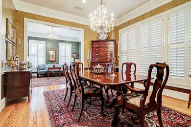The formal dining room is located adjacent to the