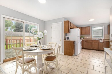 Dining Area with view of Kitchen and deck