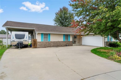 front of home, carport, and 2 stall attached