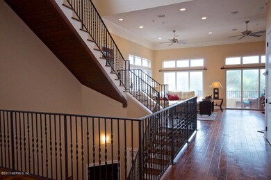 Open floor plan - wrought iron handrails