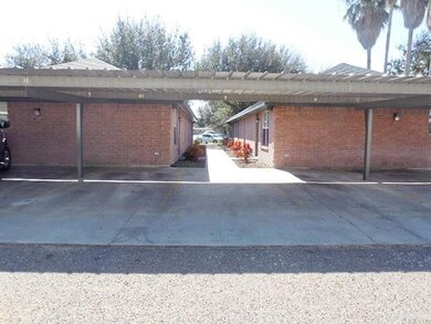 Entrance to property with brick siding