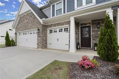 Covered front porch and 3 car garage...oh my!