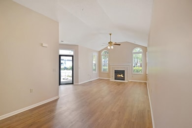 Great Room and Dining Room with LVP. The interior is freshly painted with updated LVP flooring