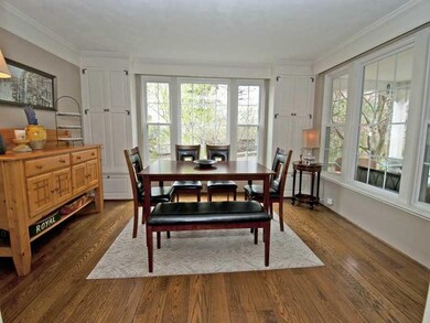 Dining Room. Wonderful paned glass windows grace t