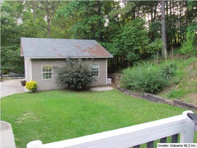 View of detached garage from back deck